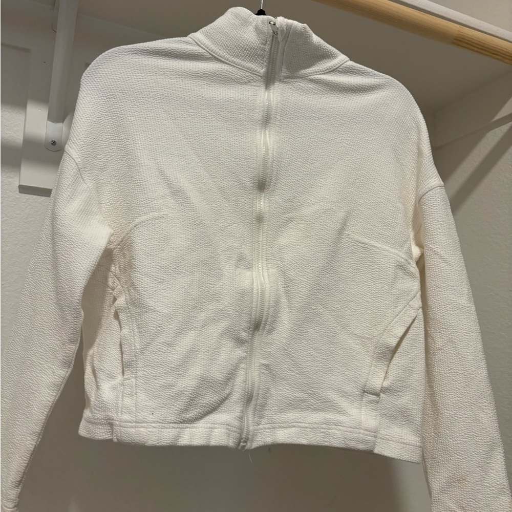 White zip up